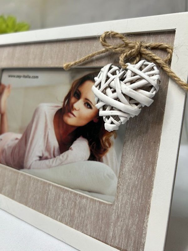 Marco corazón anudado